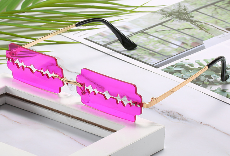 New Unique Rimless Sunglasses Ladies And Men Personalized Golden Sunglasses Fashion Small Fancy UV400 Glasses